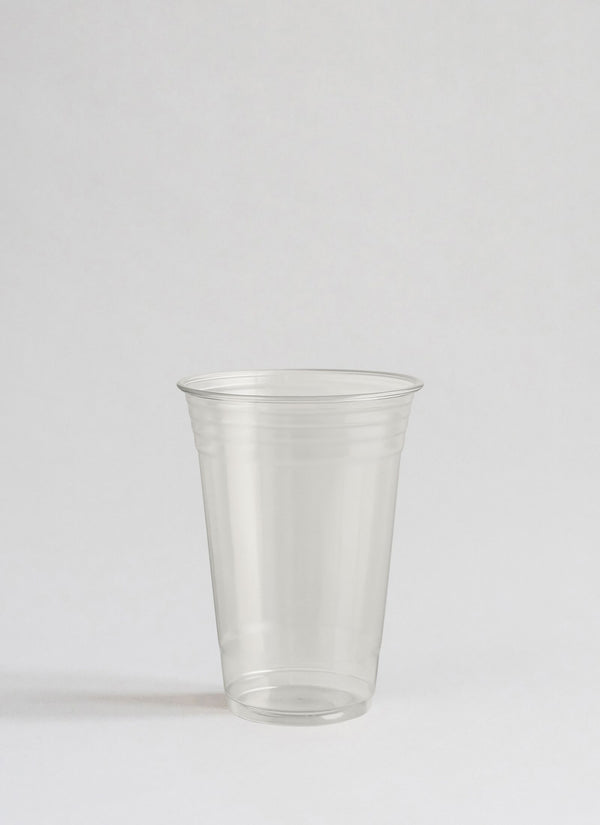 Clear plastic cup on a light gray background